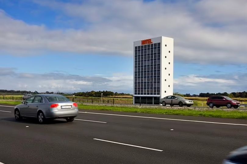 Hotel EastLink, positioned by a motorway on Melbourne’s outskirts, resembles a hotel but is a sculpture.