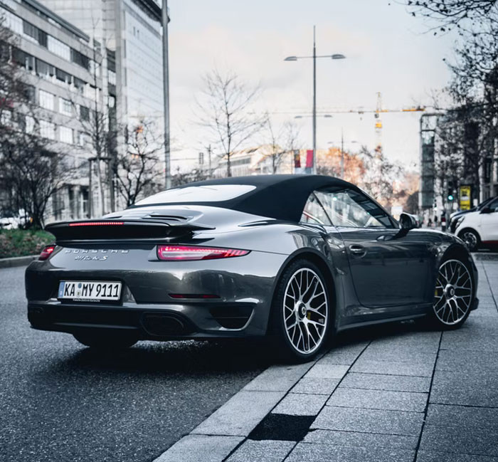 16. A caddy would rather resign than open Porsche car doors