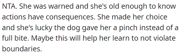 Luckily, the dog only gave her a minor warning, which might teach her to respect boundaries.