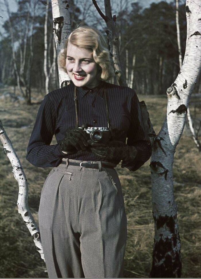 A rare Agfachrome photograph captures a blonde woman in Norway in 1943, preserving a vivid moment from the middle of World War II.