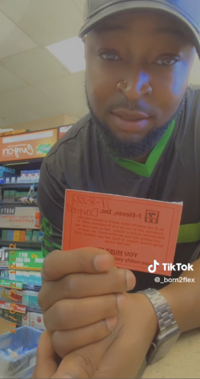 He goes to TikTok and shows off the red card that he received for not IDing the secret shopper when selling her alcohol.