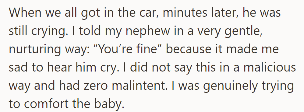 In the car, minutes later, the baby still cried. She softly tried to comfort him.