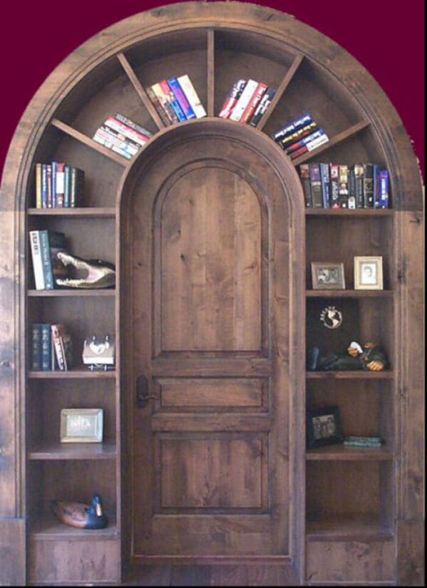 18. “Stunning Arched Doorway With Built-In Bookshelves”