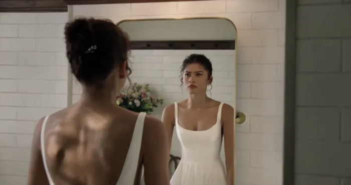 Zendaya poses in a wedding dress, sparking engagement and film speculation.