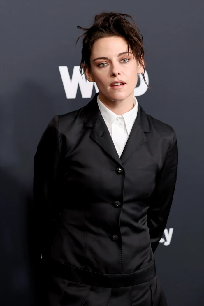 Kristen Stewart at a public event, controversy tied to immigration remarks.