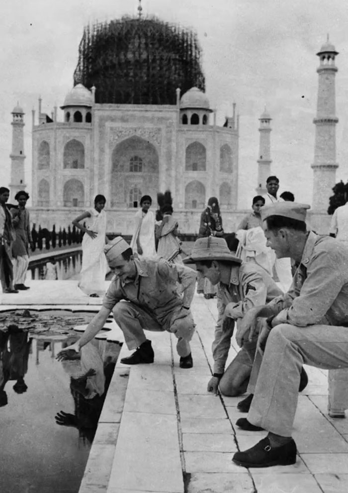 American Soldier Trying To Catch A Goldfish In The Marble-Lined Pool Of The Taj Mahal, WW2, 1942