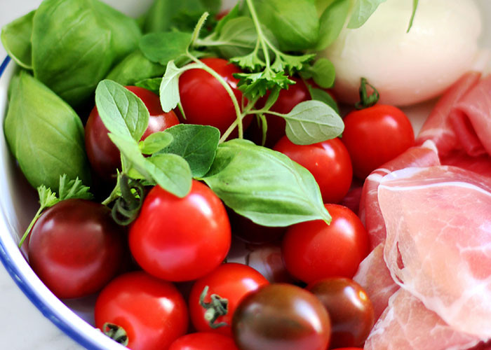 5. Cherry tomatoes just dumped into a salad whole so that they roll around your plate as you chase them with your fork. Halve them, people!