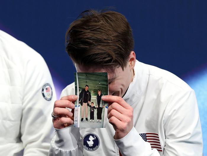 Olympian skating on ice, honoring parents after American Airlines crash tragedy.