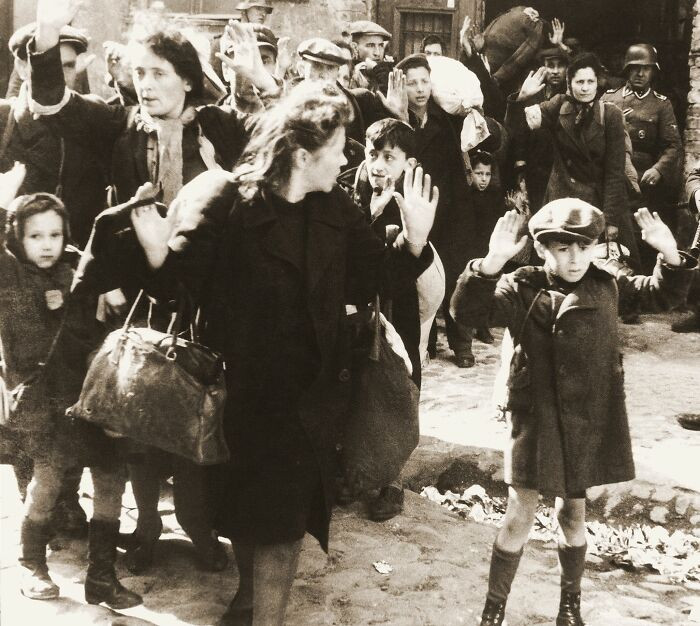 Polish Jews taken into custody by German forces during the crackdown on the Warsaw Ghetto Uprising in Poland, 1943.