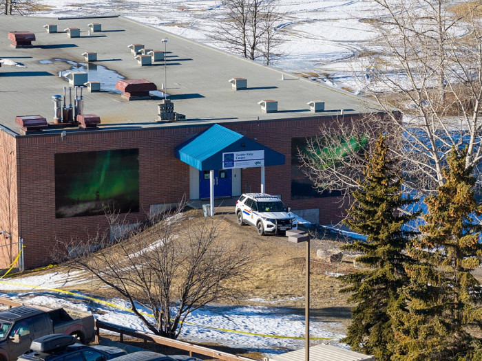 Police and emergency responders at the scene of a school shooting investigation
