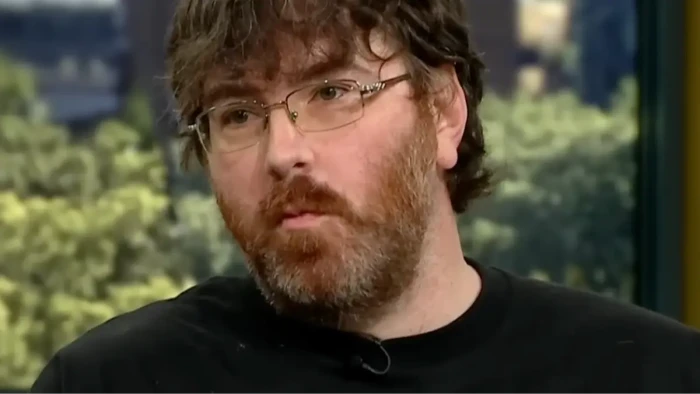 Group of peers in a casual setting, one person looks concerned about micropenis awareness