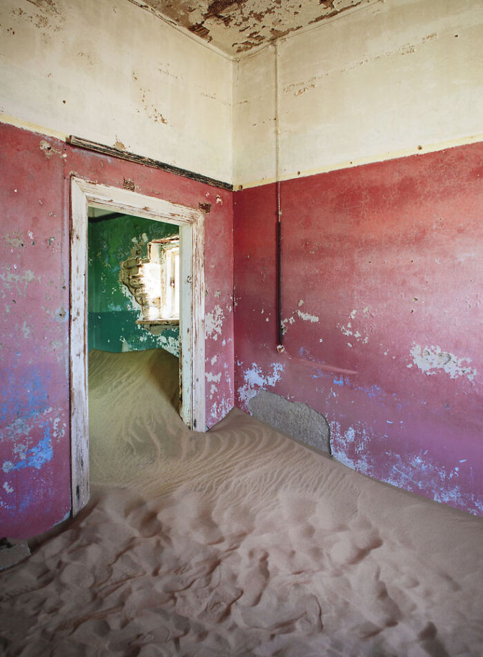 6. The red walls are stubborn, but the sand clearly won this fight