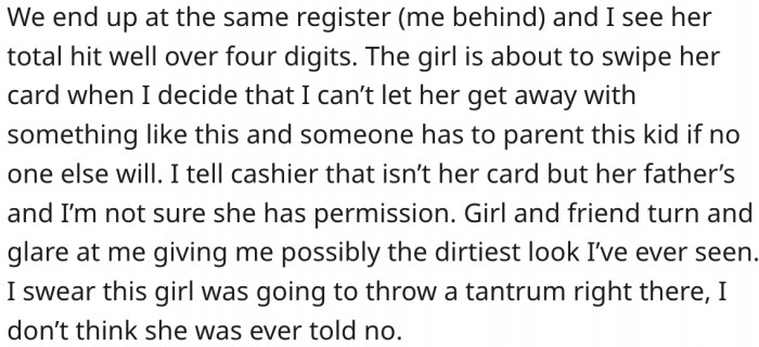 She tells the cashier and gets a nasty look in return.