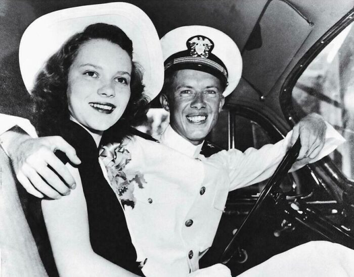 A young Jimmy Carter is pictured in his naval uniform beside his wife, Rosalynn. Their marriage lasted an extraordinary 77 years.