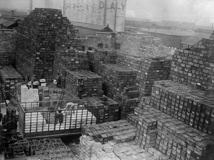 "Workers At A Brewery Unload Thousands Of Crates Of Beer, Getting Ready For The End Of Prohibition. April, 1933"