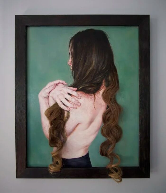 "Oil on linen with applied synthetic hair."