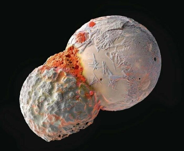 "Microscopic Dust Particles Under An Electron Microscope Resemble Cosmic Collisions"