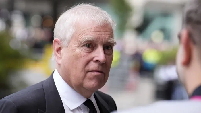 News backdrop with police investigation details on Andrew Mountbatten-Windsor allegations.