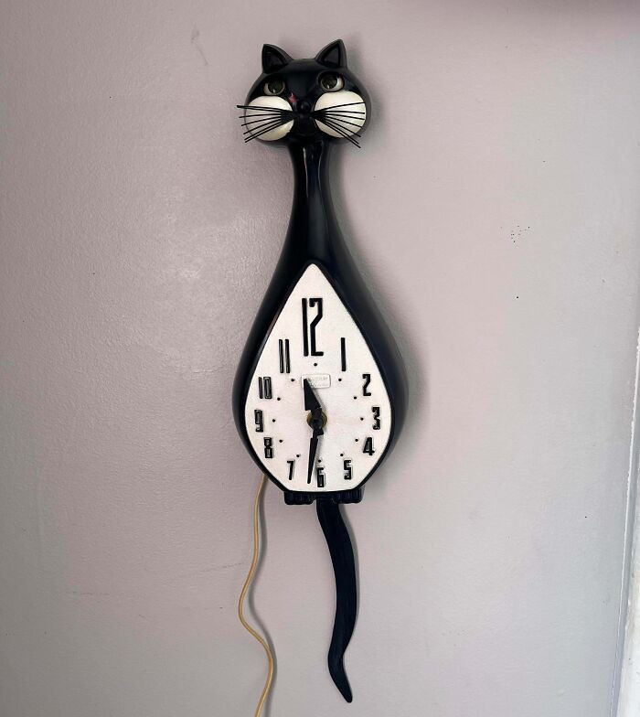 Found this goofy little cat clock