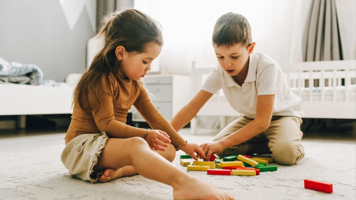 Parent and child reviewing toy safety checklist, attorney tips for safer purchases