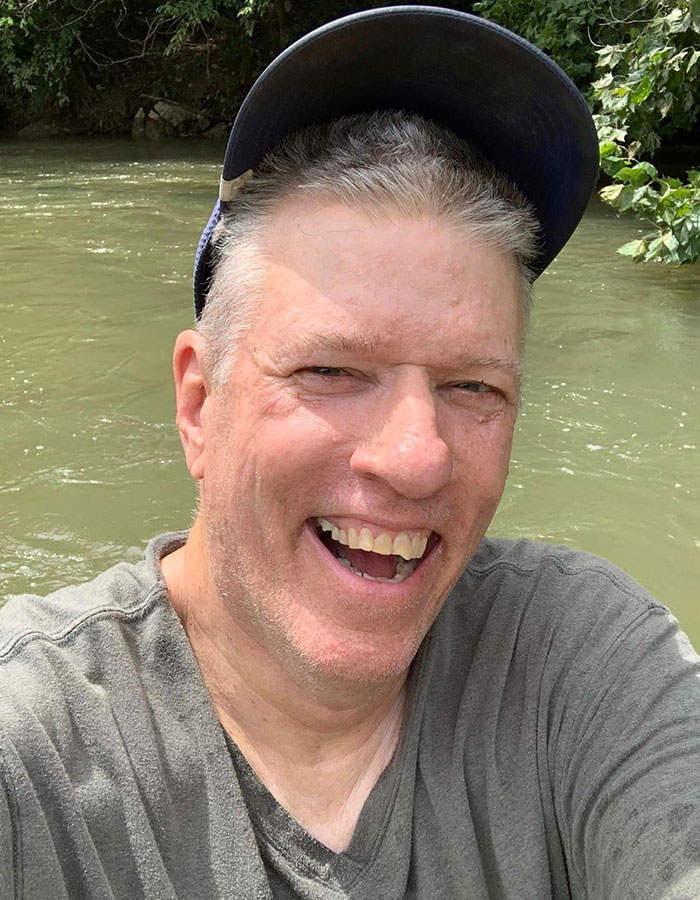 Smiling through the controversy: Russ McKamey was arrested for assault earlier, but the charges were dropped—leaving the internet outraged.