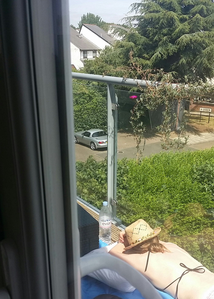 25. My wife doesn't know I'm working from home today. This is my wife working on her novel. Expected release date: 2052.