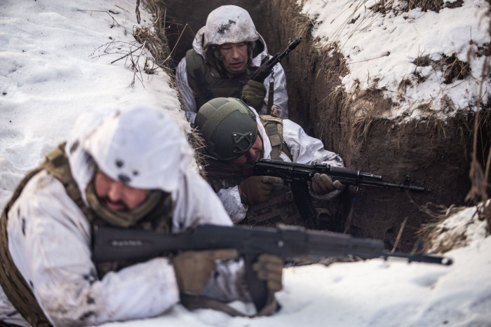 Russian military personnel in uniform, reflecting strain from high casualty rates