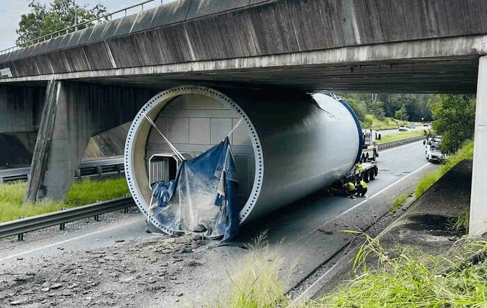 "Truck Carrying Wind Turbine Gets Stuck Under Bridge Closing Highway - Australia"