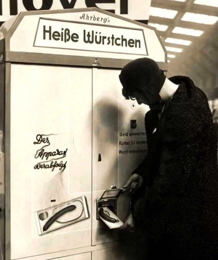 Slot Machine Selling Warm Sausages On A Railway Station In Germany, 1931