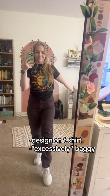 The excessively baggy outfit is amusing, especially after she was told that she was wearing tight and revealing clothes in the other photos.