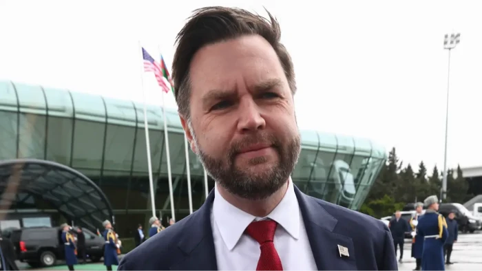 JD Vance addressing political issues, discussing the Republican Party’s direction.