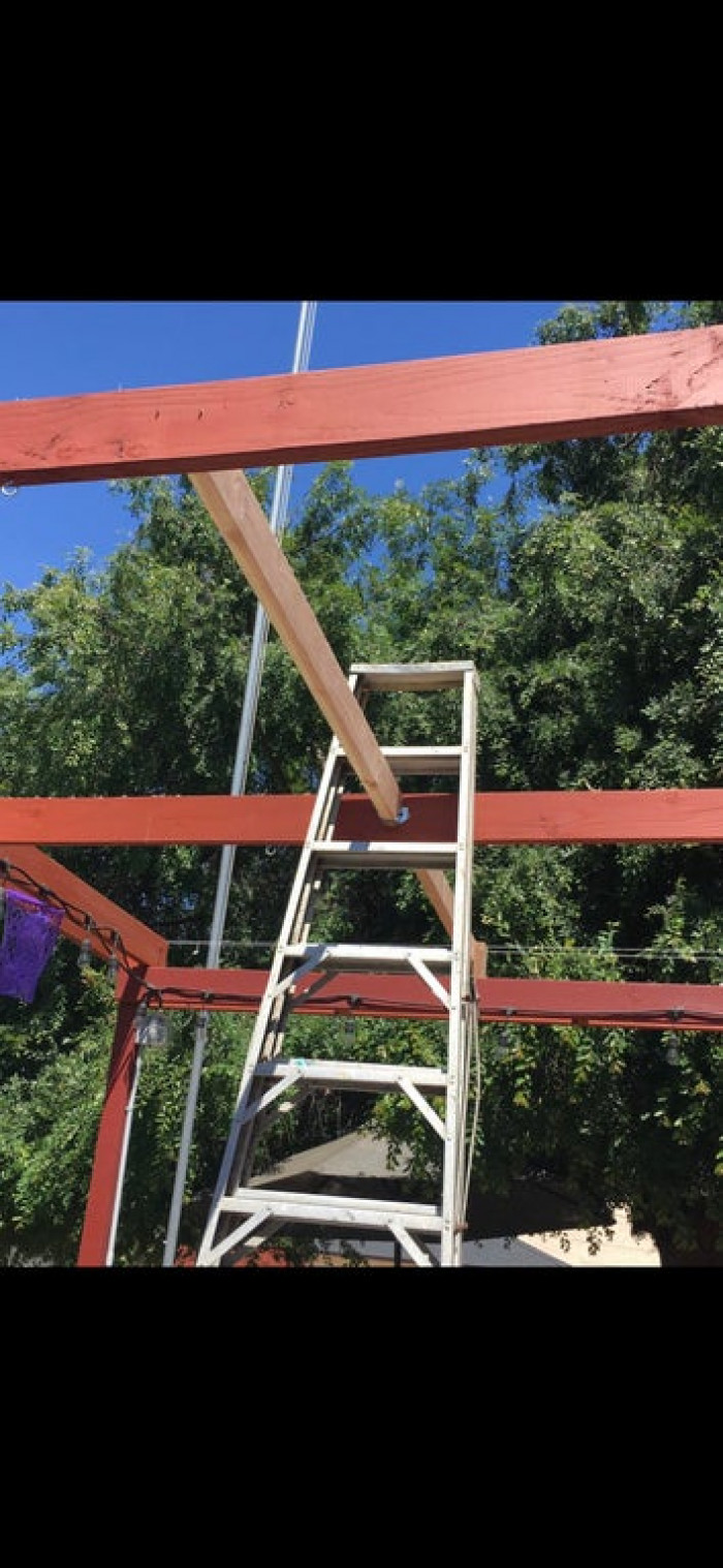 13. “Brother-in-law repairing his awning.”