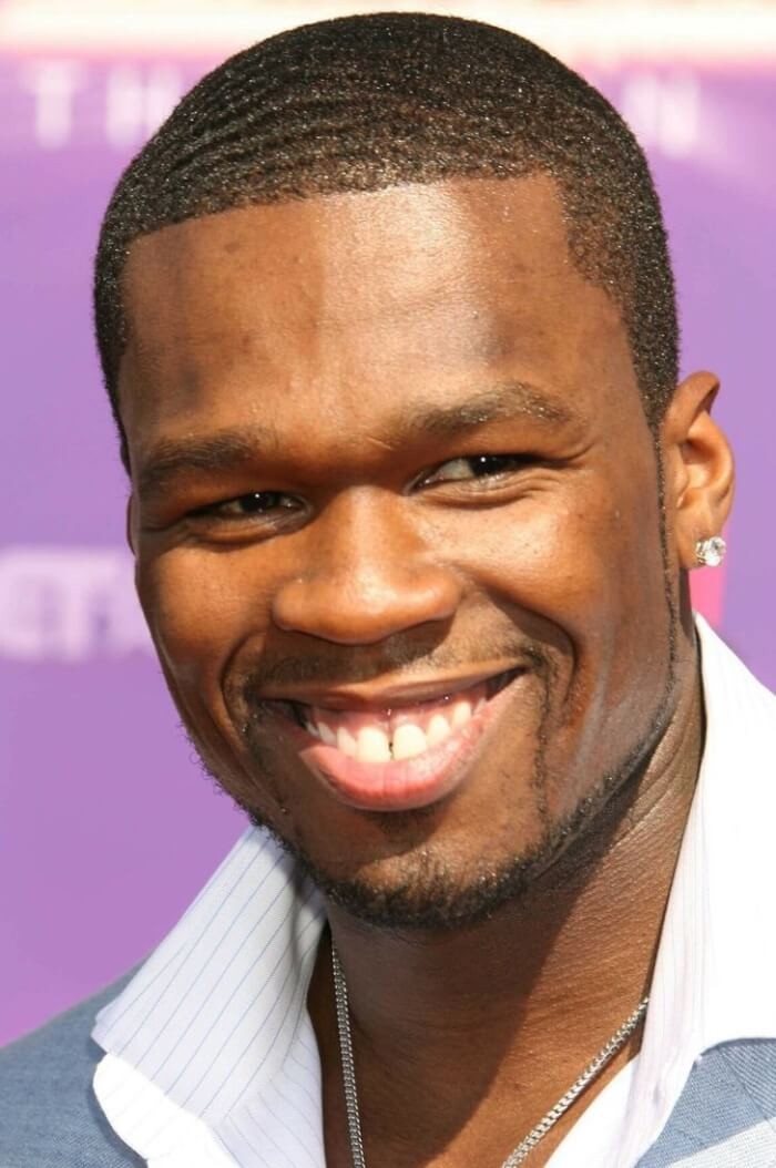 8. For years, popular rapper 50 Cent performed while missing his front teeth.