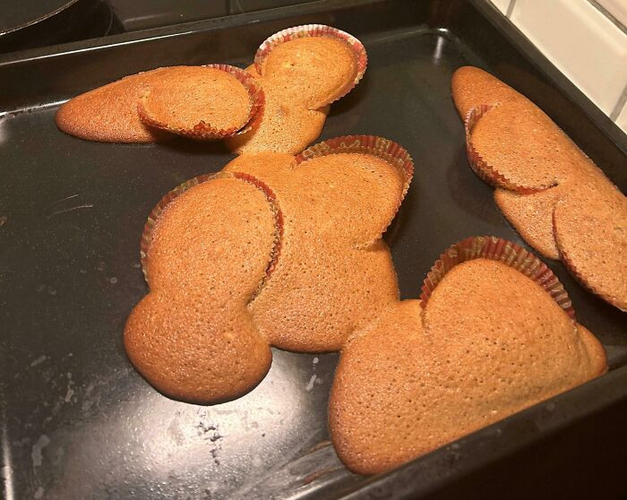 "First Attempt At Muffins. I Might've Overfilled Them A Little. At Least They Tasted Good With Some Raspberries On Them"