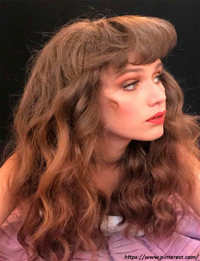 18. Upper Sleek With Bottom Crimpled Hairstyle