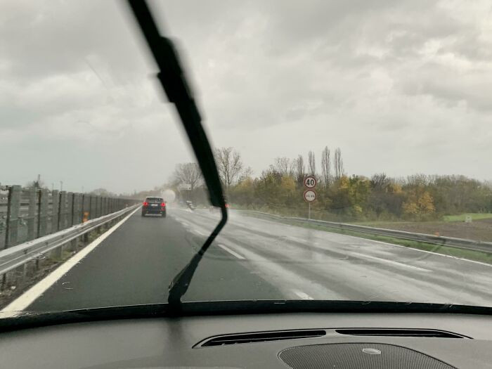 "Draining Asphalt vs. Normal Asphalt During A Storm"