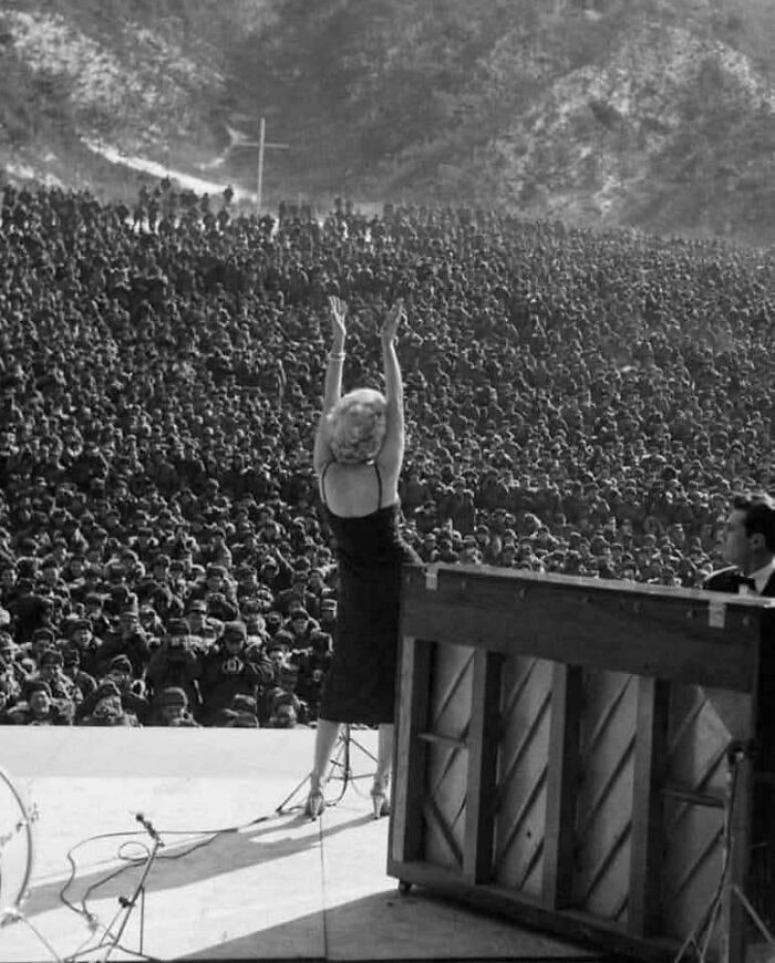 "Marilyn Monroe Hosting 100,000 American Troops in Korea, 1954."