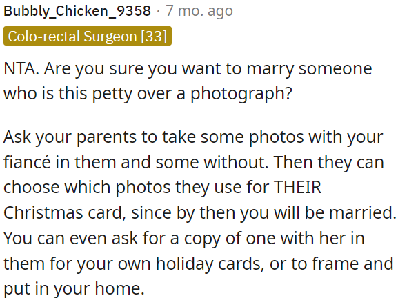OP can suggest taking photos with and without his fiancée for his parents' Christmas card.