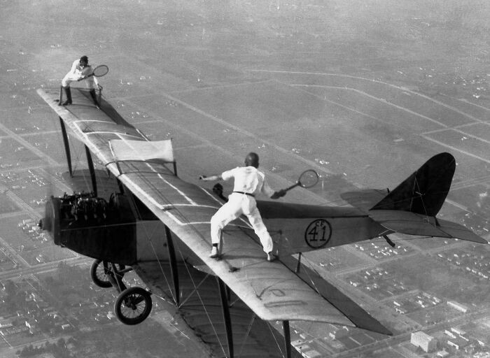 "Gladys Roy And Ivan Unger Play Tennis On The Wing Of A Biplane In Flight, 1925"