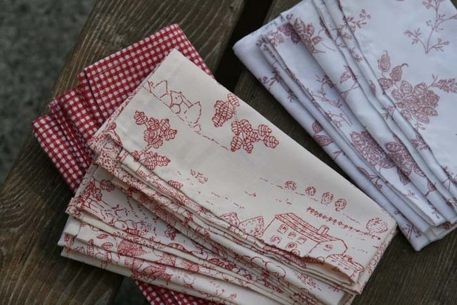 14. Create retro cloth napkins by repurposing cute vintage bed sheets.