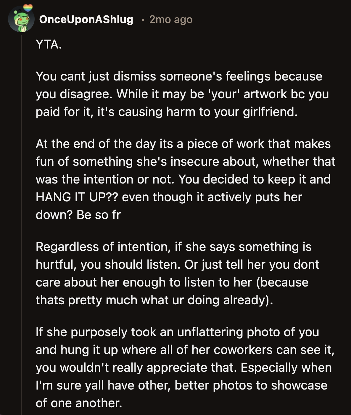 OP did listen to his girlfriend when she explained why the drawing hurt her. He just cared more about how he felt about it.