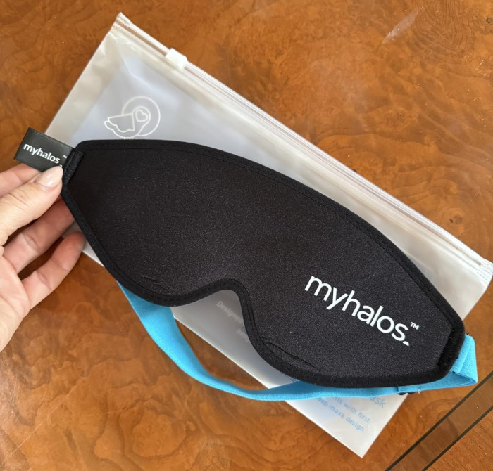 Close-up of blackout sleep mask, suggesting psychological cue for sleep hygiene