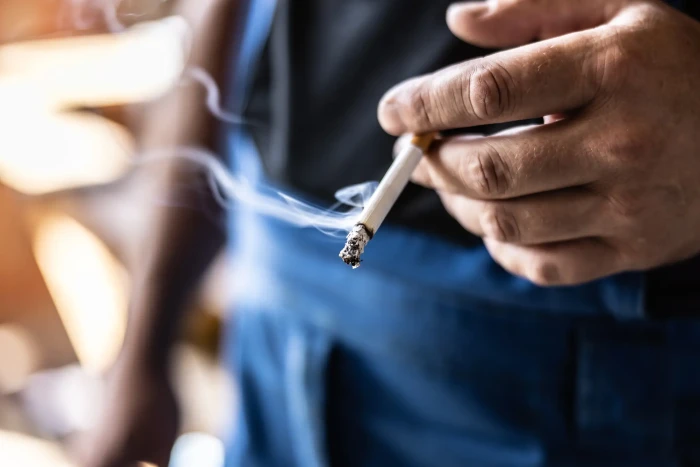 UK social smoking trend headline, highlighting misconceptions about first cigarette risks