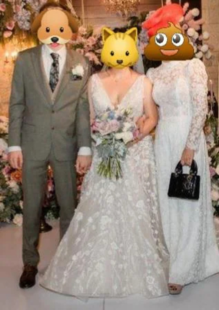 27. Mom's friend and her tailored lace white gown.