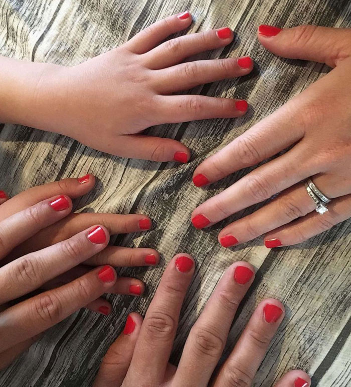 The family with their painted nails