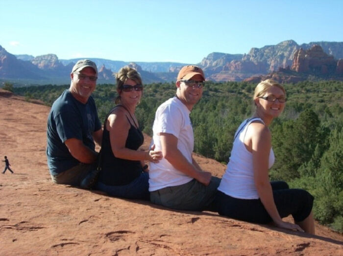 "Can You Spot The Little Guy? This Isn’t A Family Of Giants – They Just Took A Photo On A Mountain That Blended Perfectly With The Rock Below It"