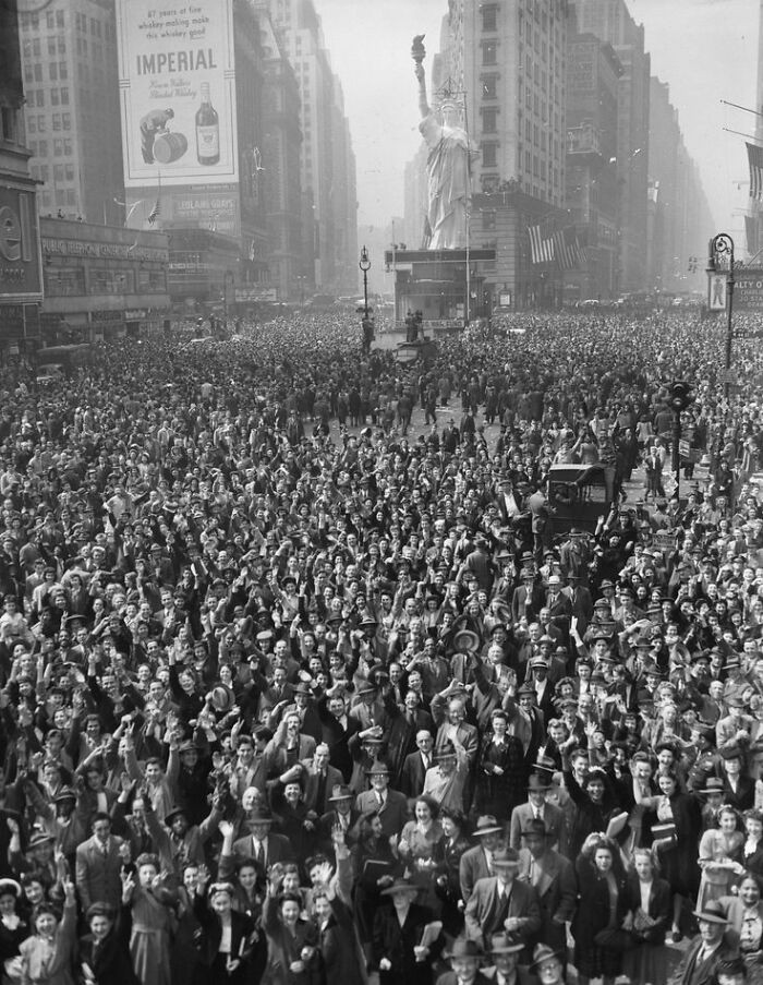 "Crowd In Times Square, New York City Celebrating The Surrender Of Germany, May 7th, 1945"