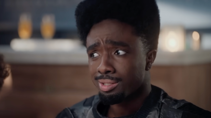 Caleb McLaughlin on stage during SNL debut, facing fan backlash