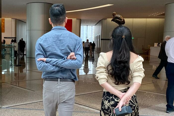 23. There's no way that guy's taking a dump on her head