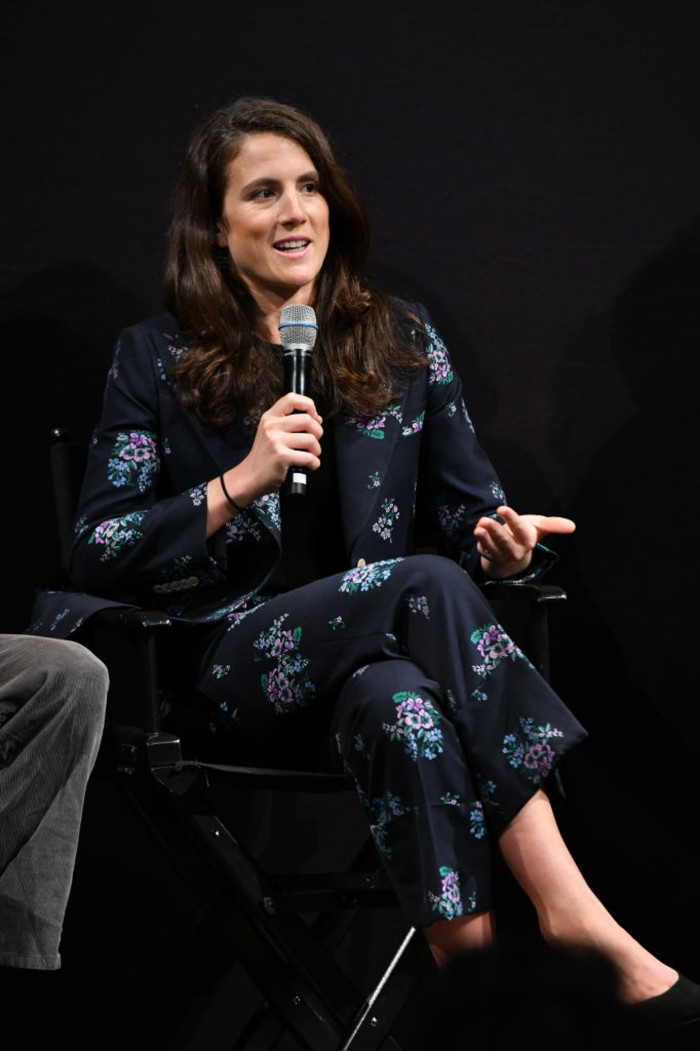 Donald Trump speaking at a public event, referencing the Kennedy family controversy